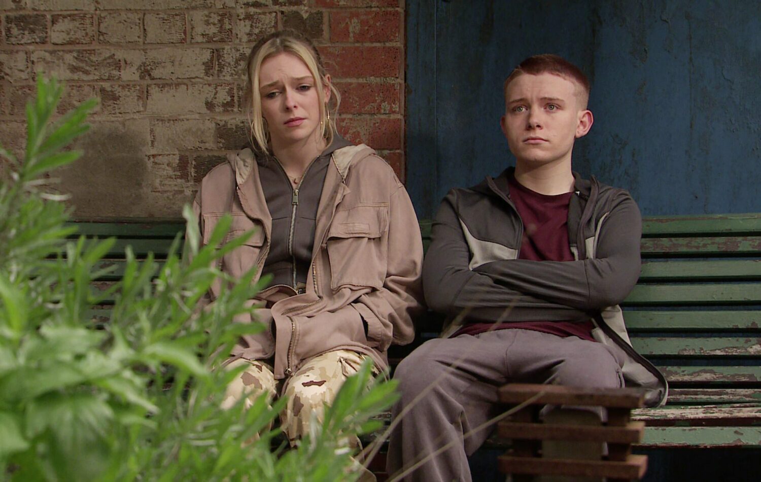 Max and Lauren in Corrie both look upset in Victoria Garden
