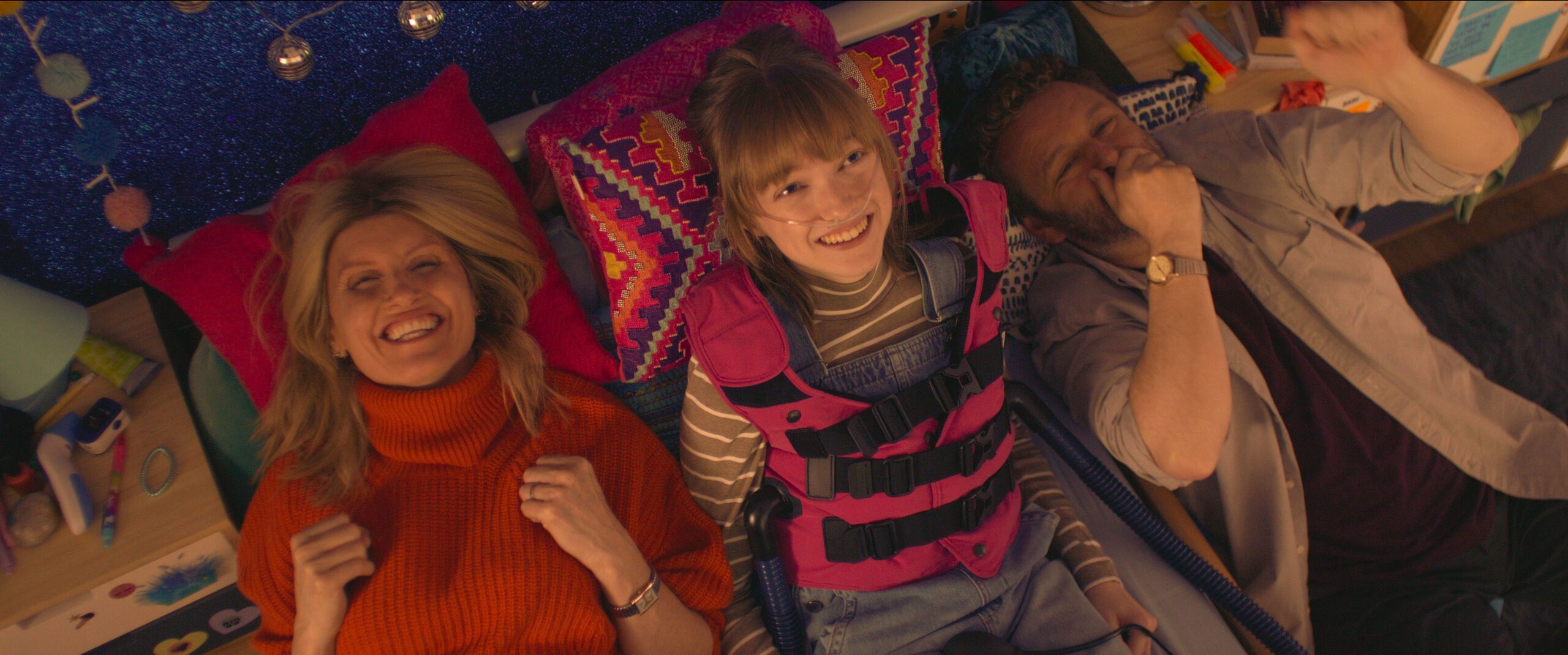 Niamh Moriarty with onscreen parents Sharon Horgan and Michael Sheen in Best Interests on BBC