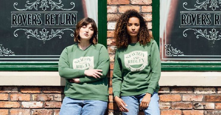 Coronation Street's Rovers with two models wearing Newton and Ridley green jumpers standing outside