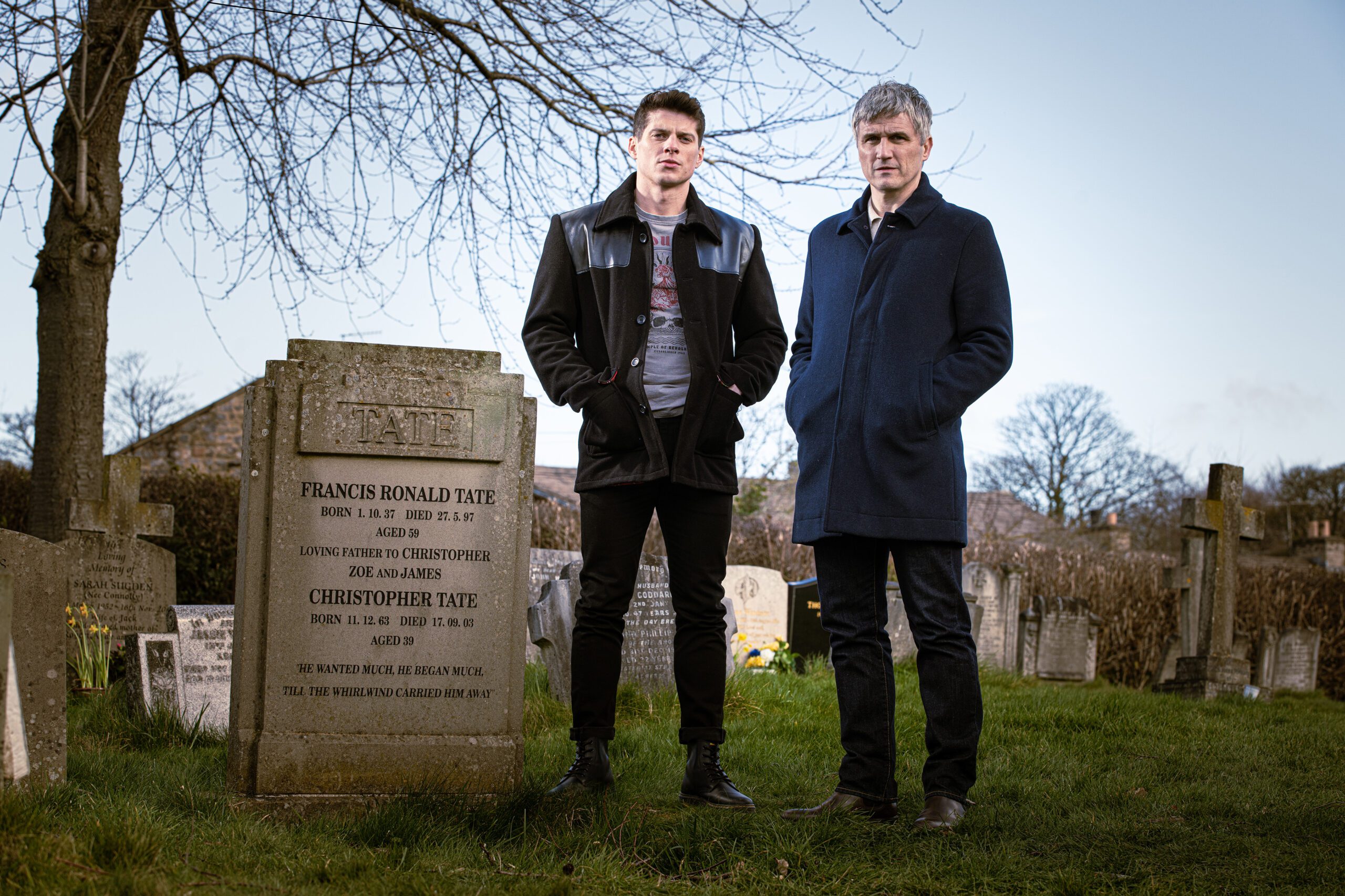 Emmerdale father and son Nicky and Caleb stand by Franke Tate's grave looking moody