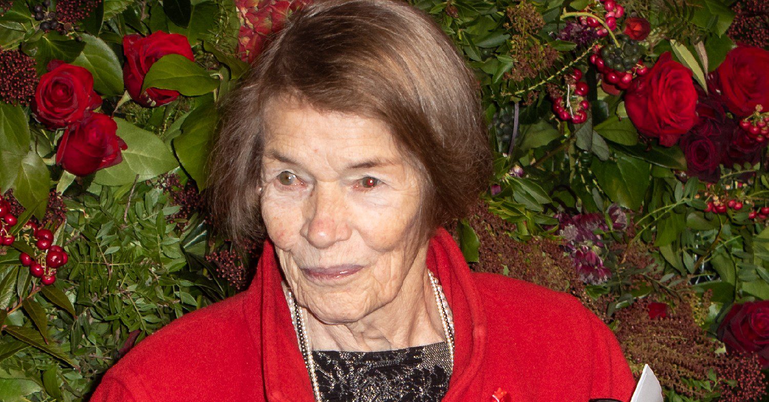 Glenda Jackson attending event in red coat