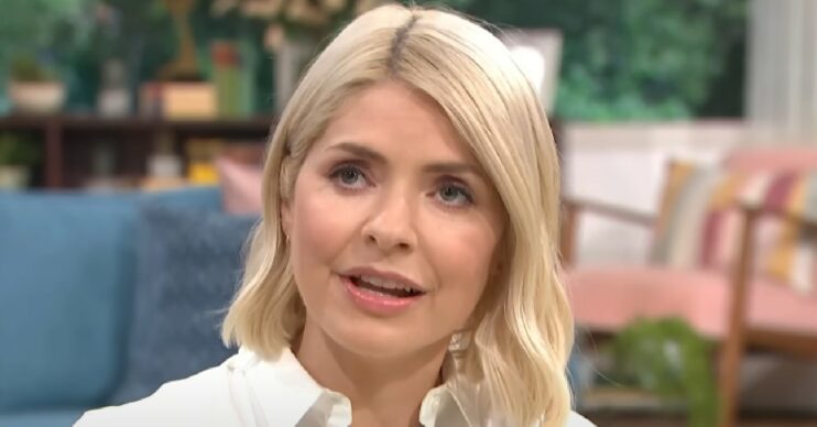 Holly Willoughby looking up and speaking on This Morning