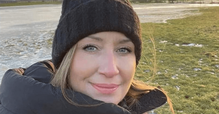 Nicola Bulley smiling in a bobble hat