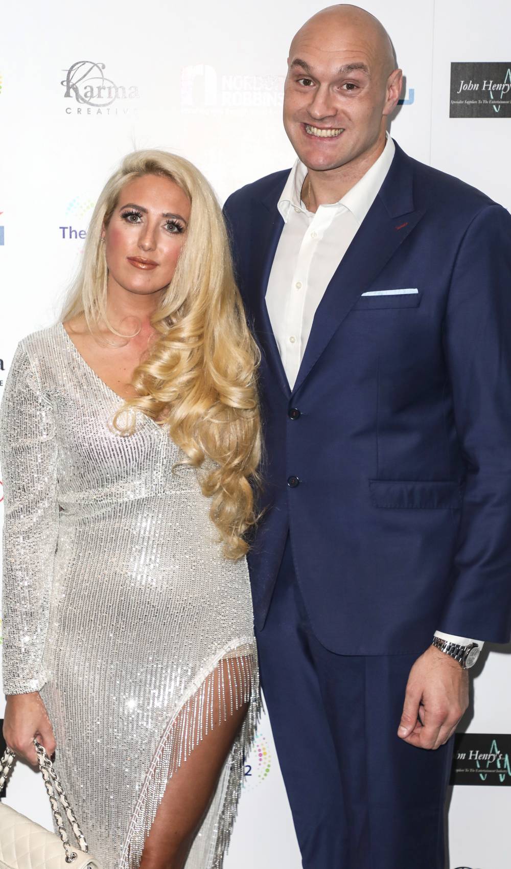 Paris Fury and Tyson Fury pose for the cameras