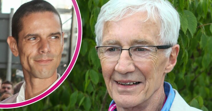 Paul O'Grady and husband smiling at events