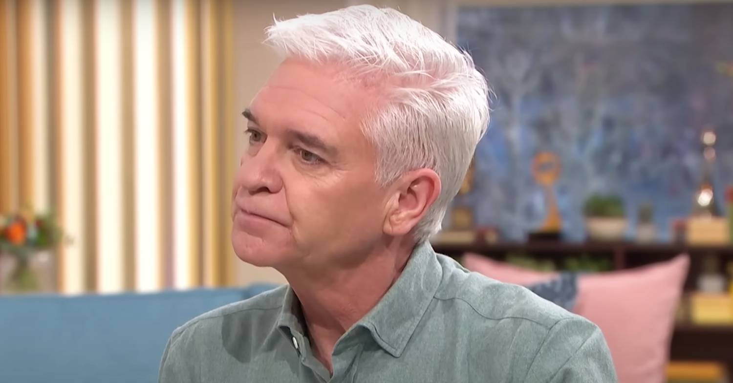 Phillip Schofield listens intently