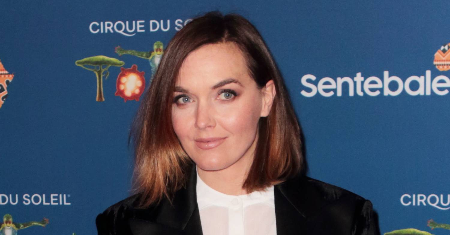 Victoria Pendleton stands on a red carpet