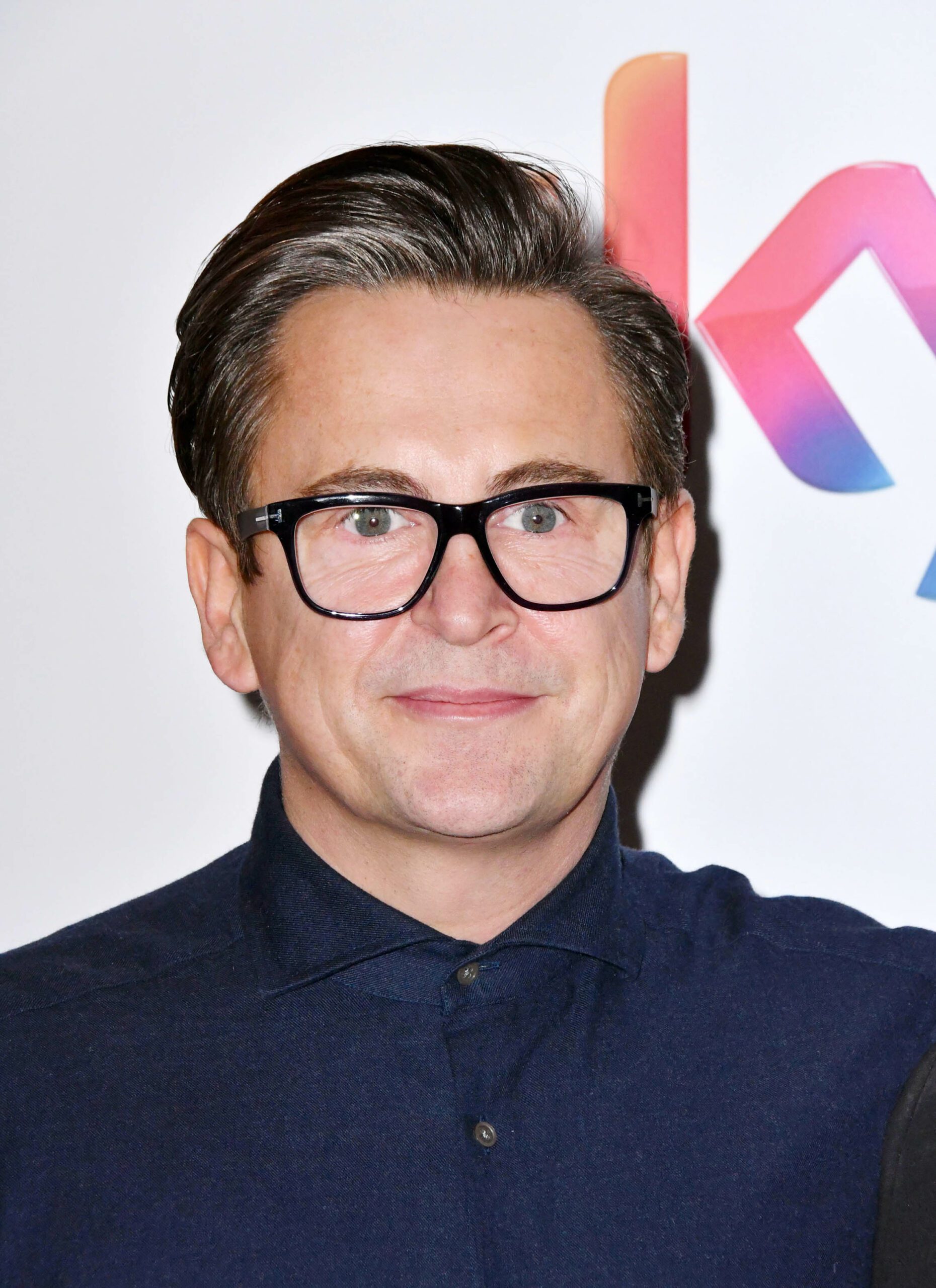 Stephen Webb smiles at event