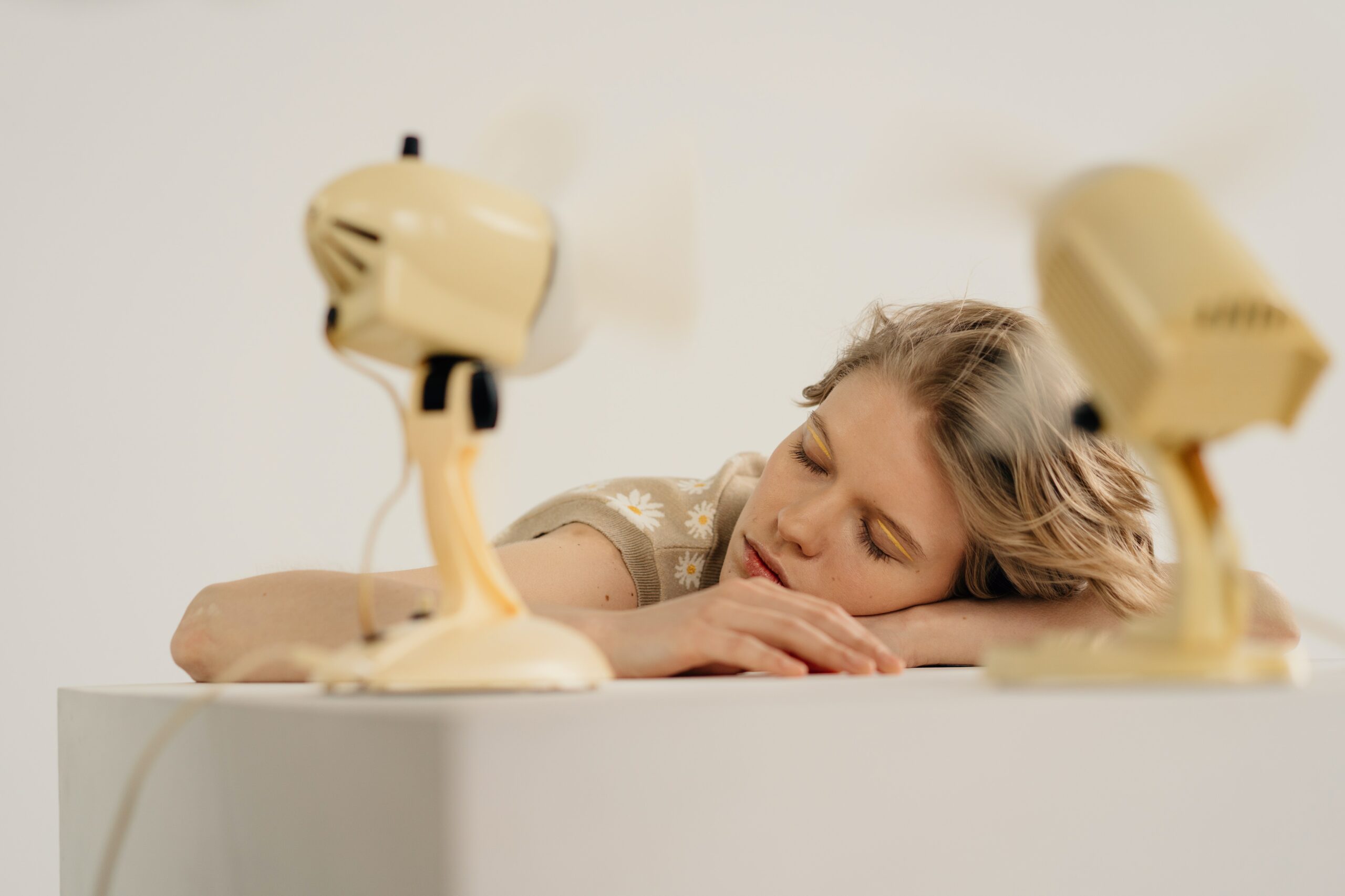 Peri-menopausal article - woman with a fan