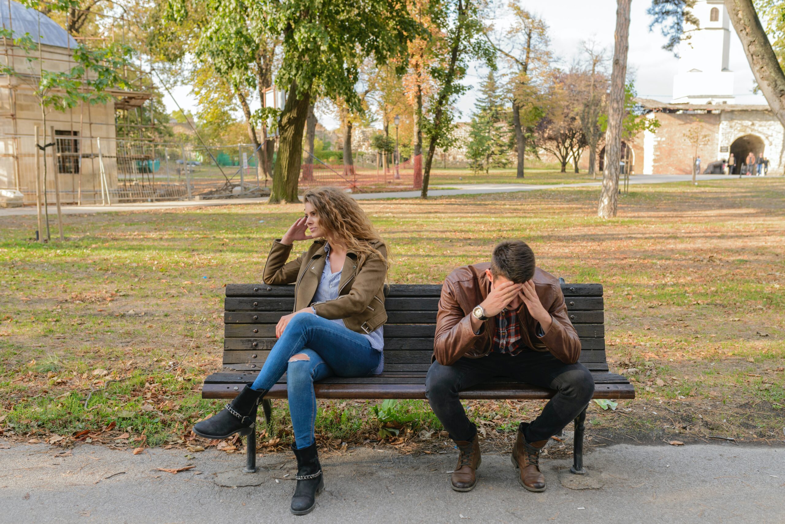 A couple argue in a park