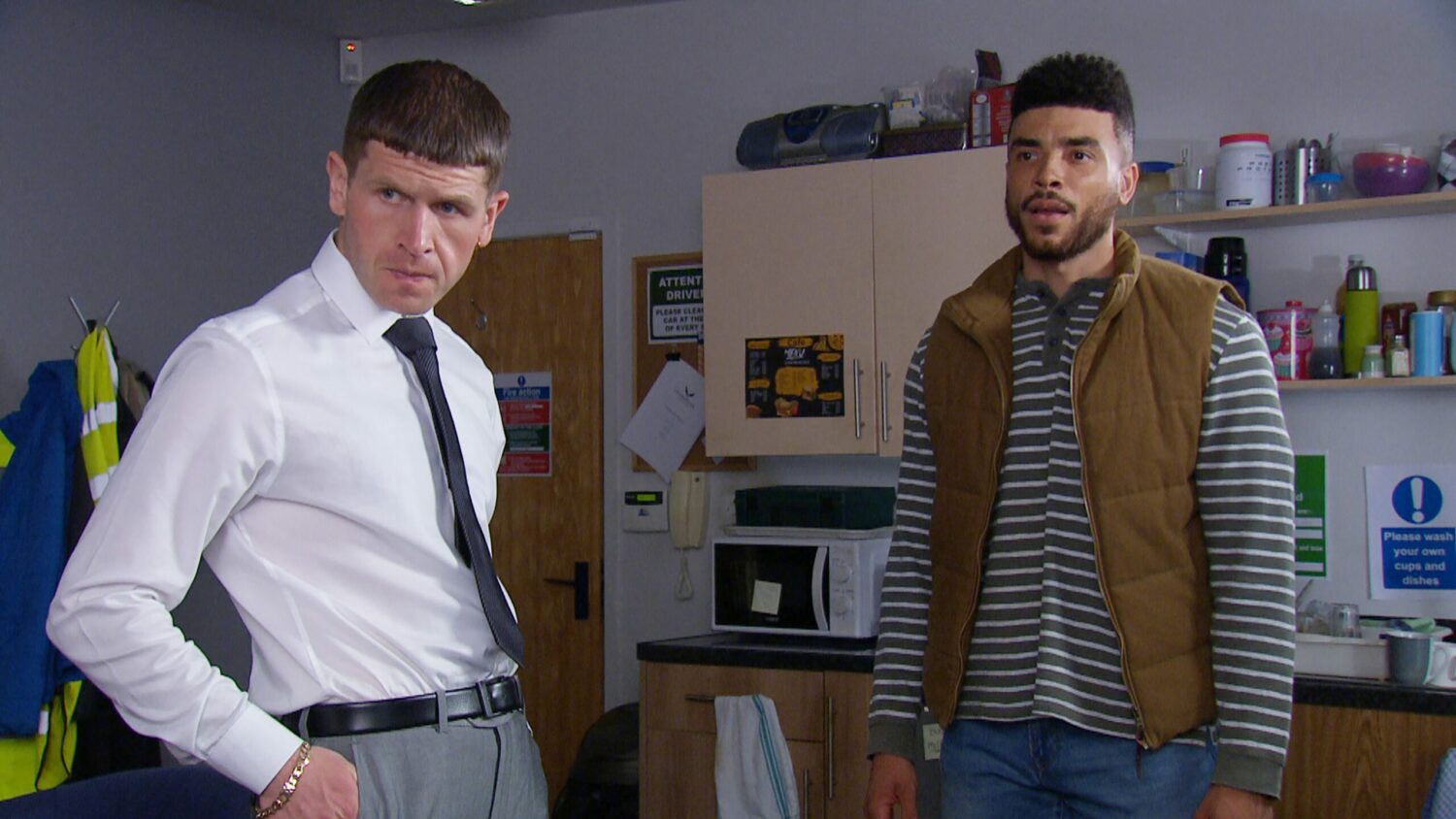 Corey and Nate in Emmerdale look shifty