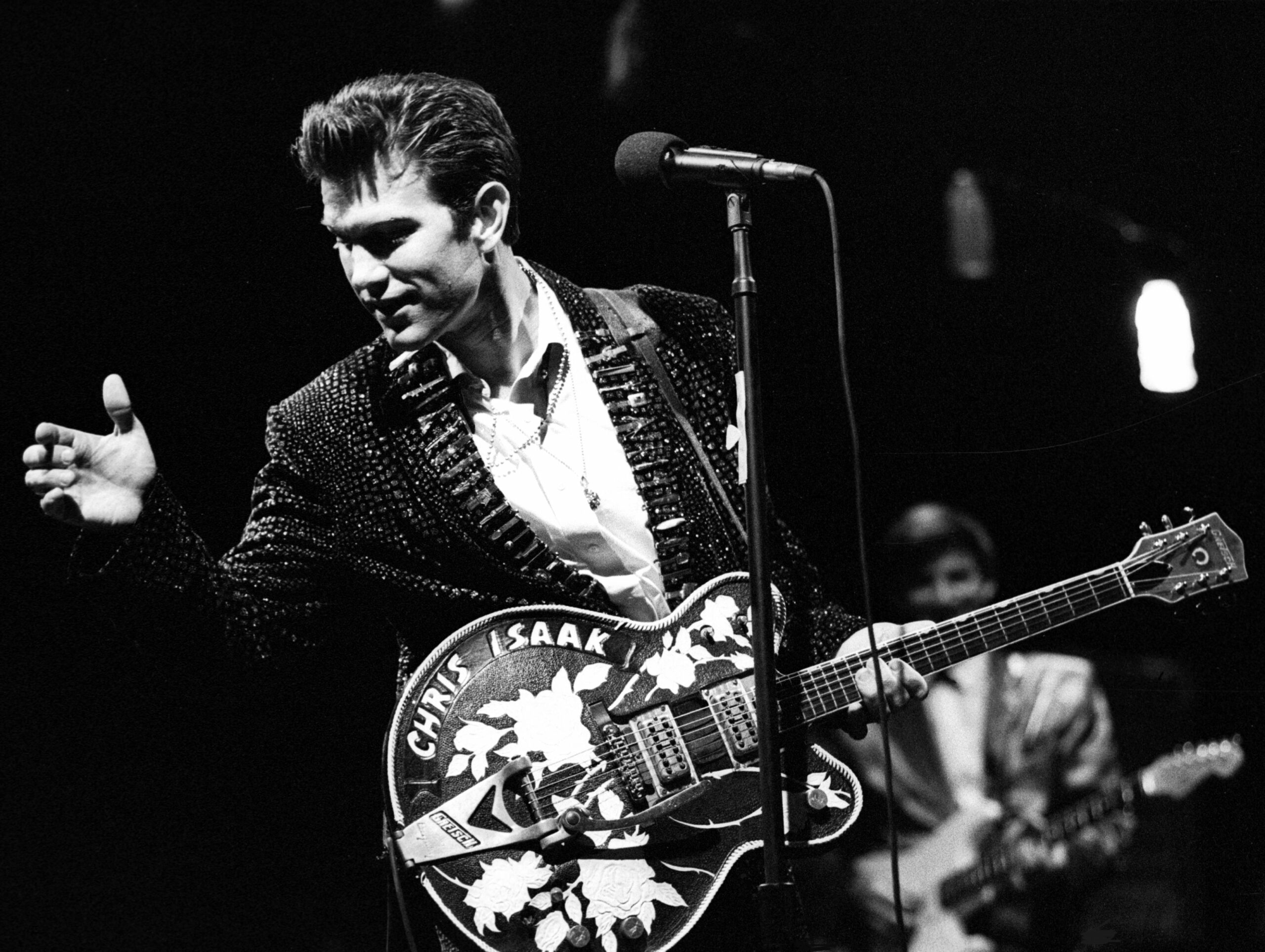 Chris Isaak performing in 1989