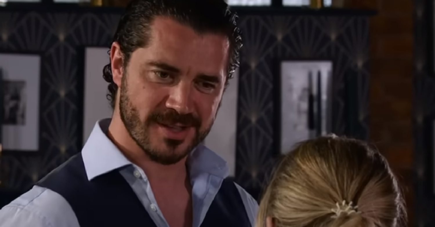 Coronation Street's Adam looking at Sarah