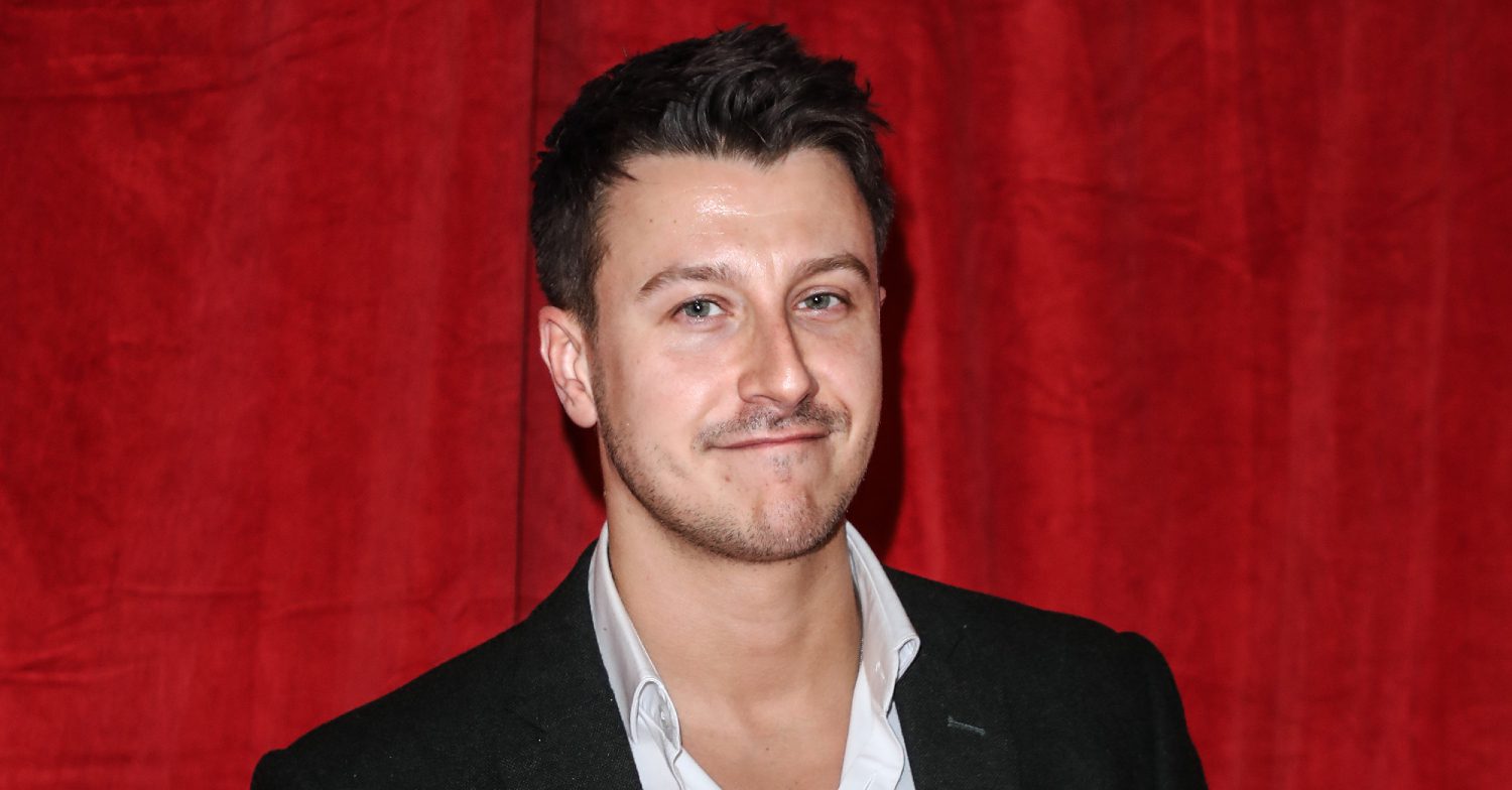 Coronation Street's Ryan Prescott is smiling on the red carpet