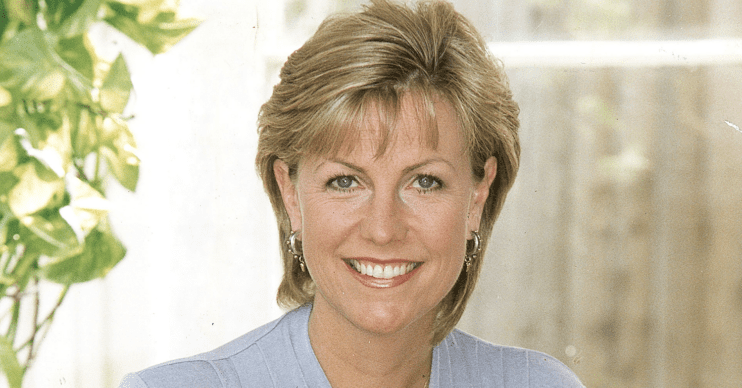 Jill Dando smiling wearing pale blue