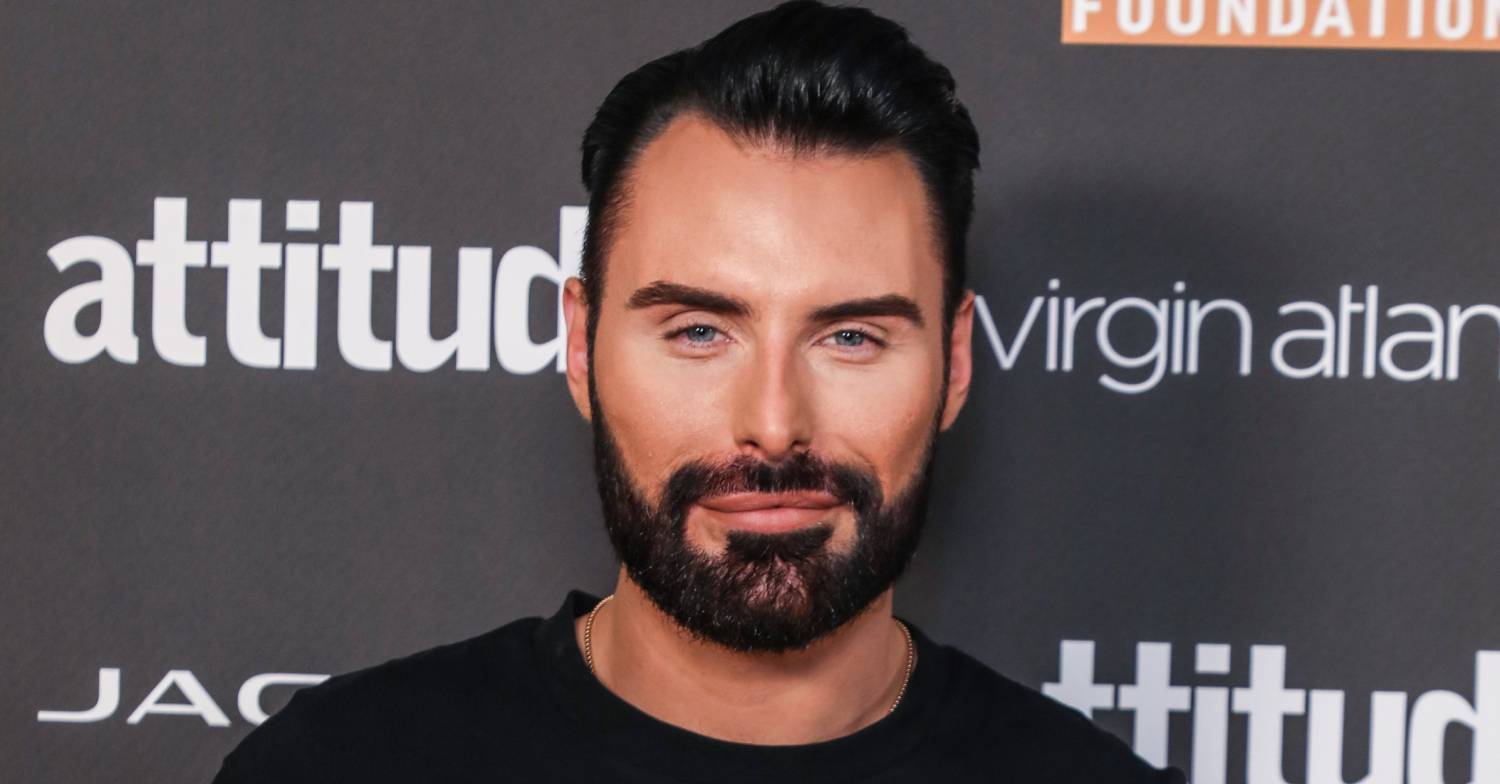 Rylan smiles