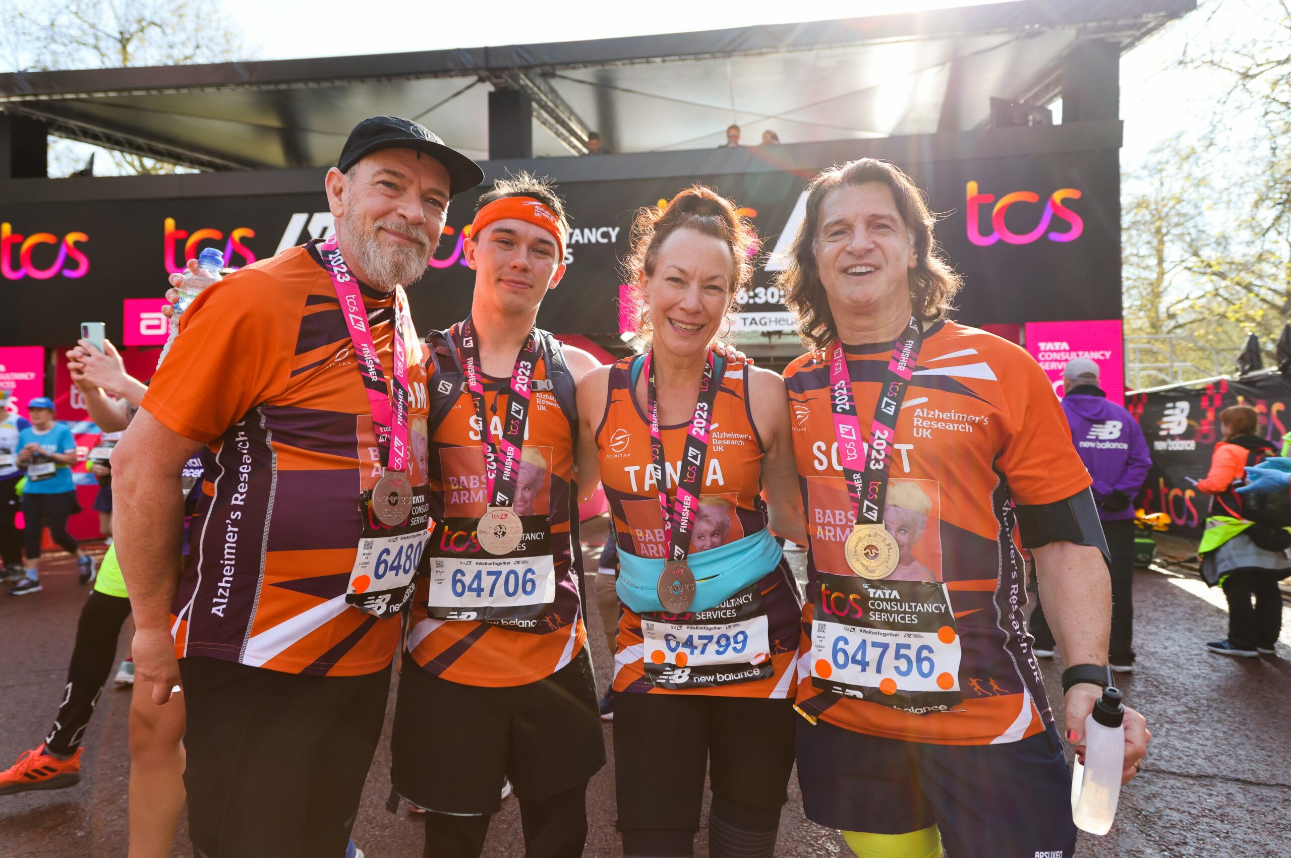 Tanya Franks and Scott Mitchell with EastEnders stars at London Marathon