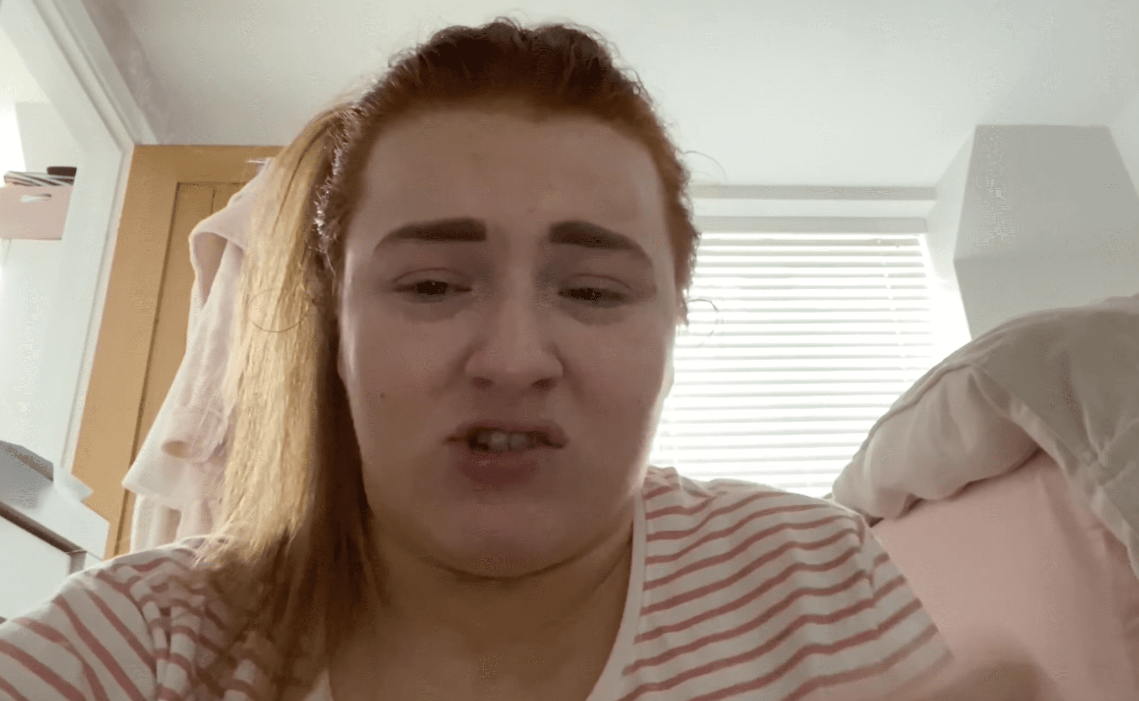 Amelia Martin looking upset talking to camera