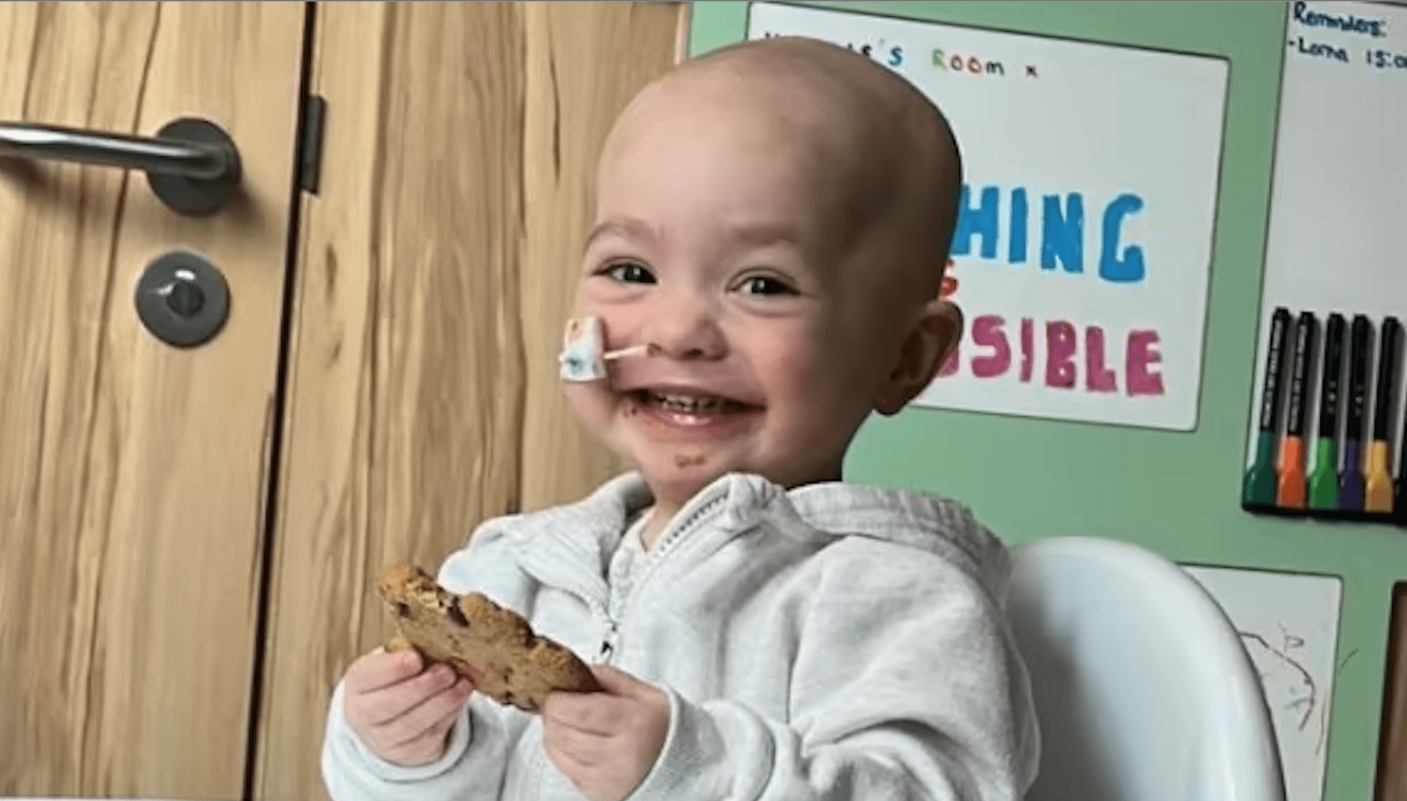 Little girl in hospital with a tube up her nose