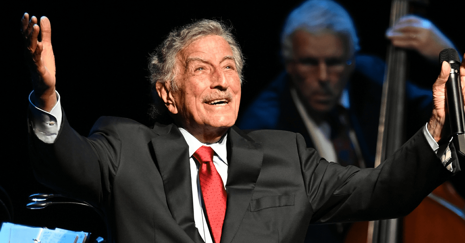 Tony Bennett singing on stage