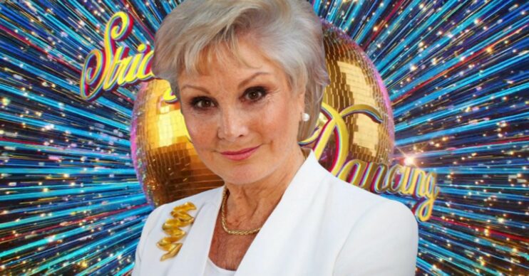 Angela Rippon in front of Strictly logo