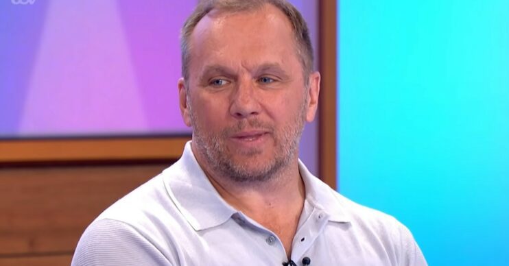 Dean Andrews smiles as he's interviewed on Loose Women