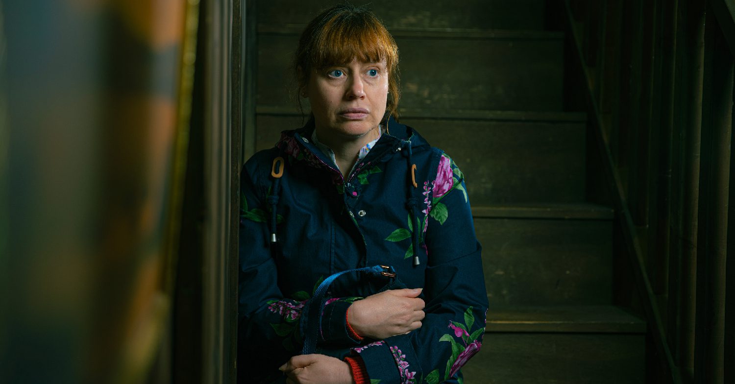 Emmerdale's Lydia is sitting on the stairs in shock