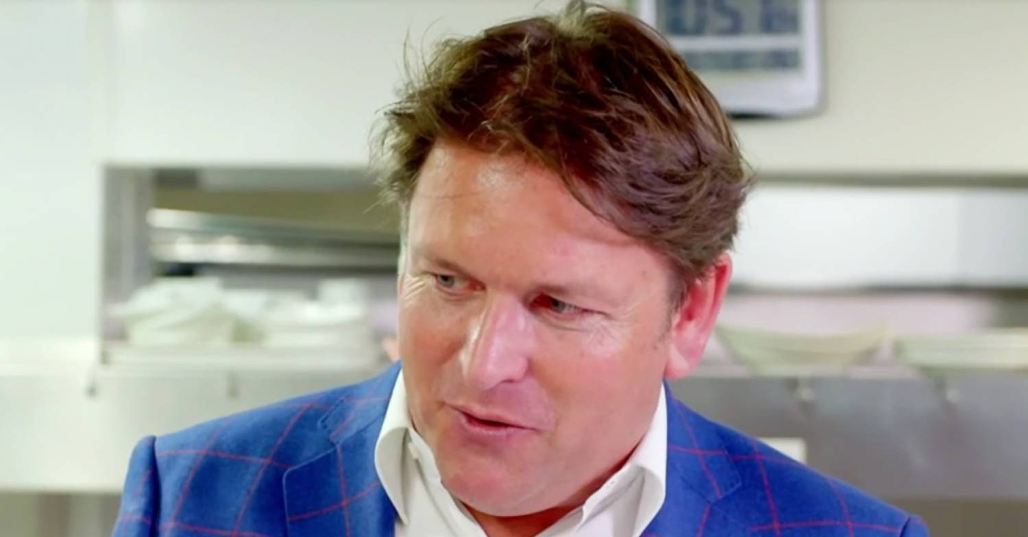 James Martin speaks to someone