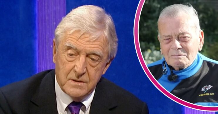 Michael Parkinson looks downward, Dickie Bird is tearful