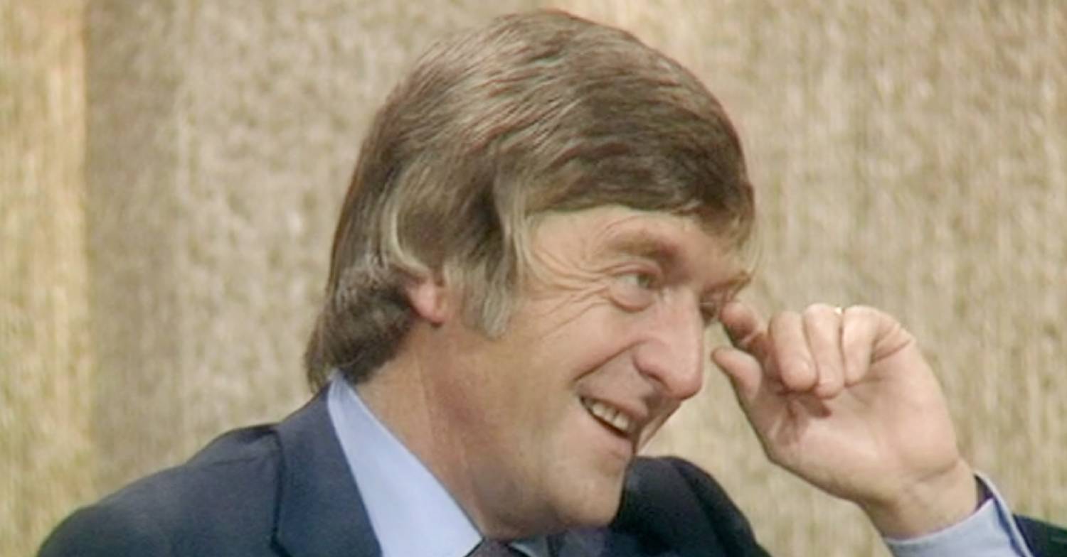 Michael Parkinson puts a finger to his brow