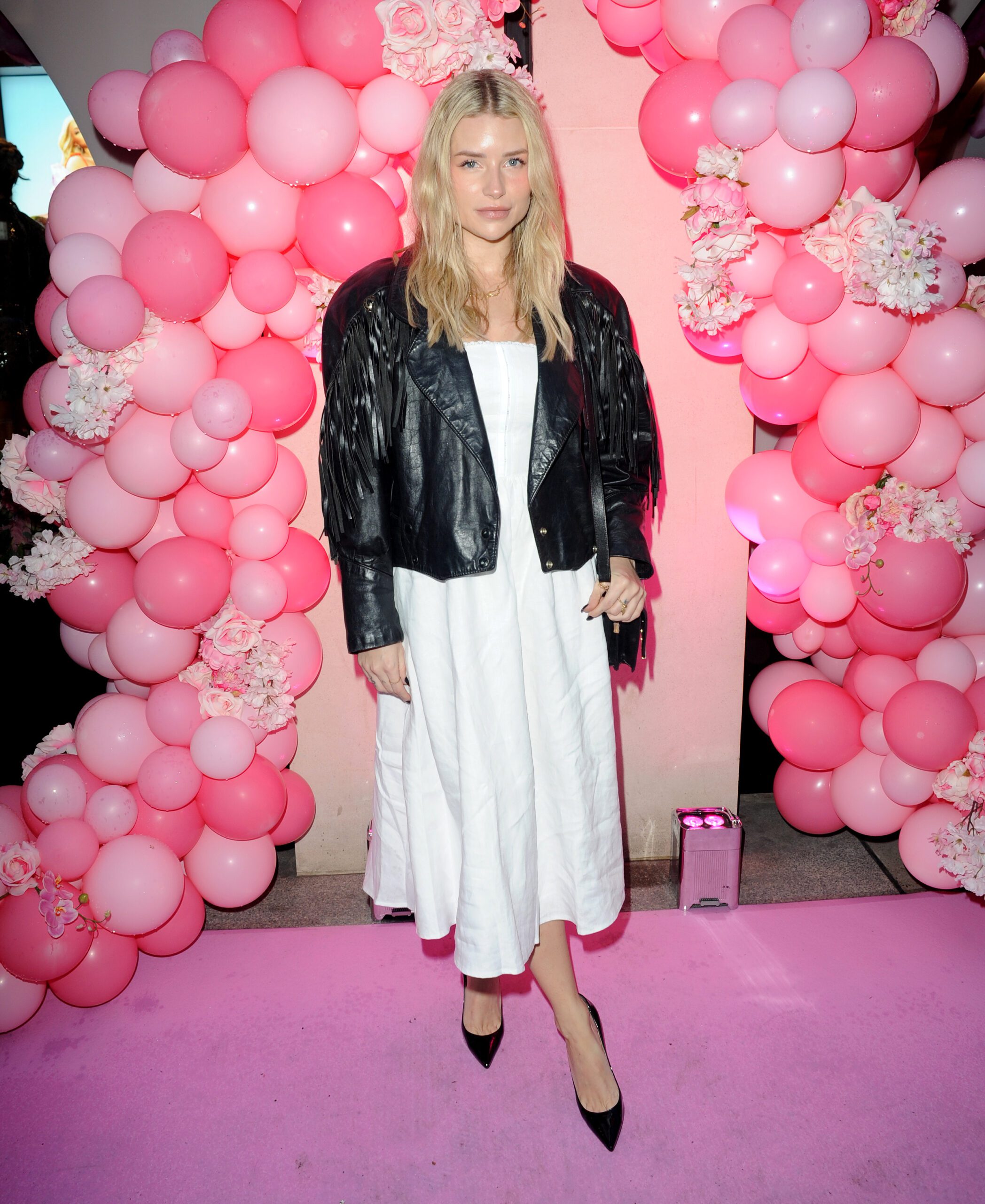 Lottie Moss posing