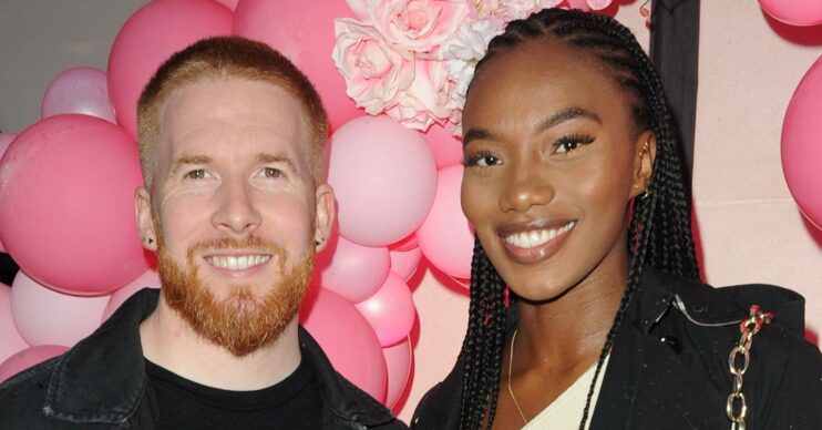 Strictly pro Neil Jones and Chyna Mills both smiles