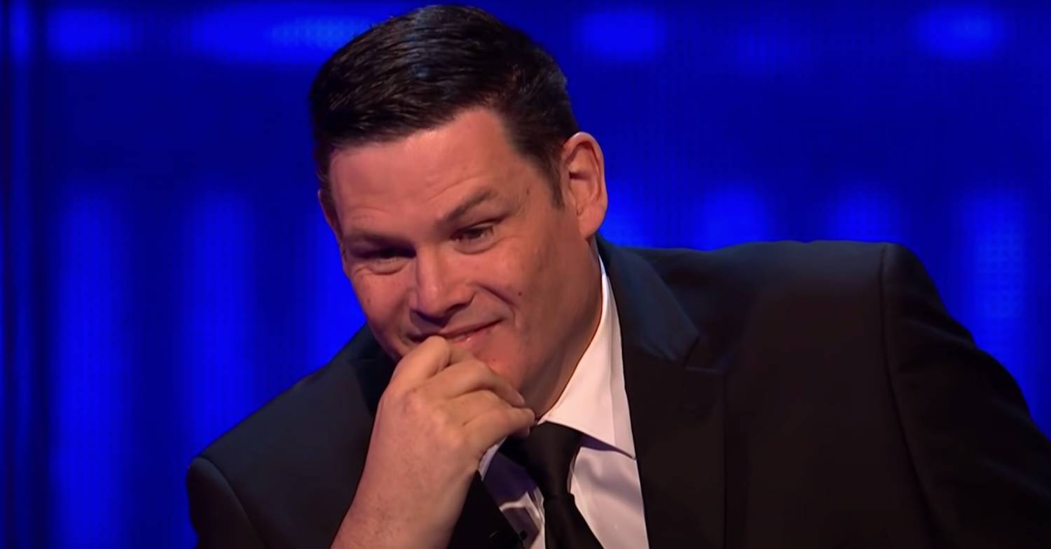 Mark Labbett rests his chin on his hand