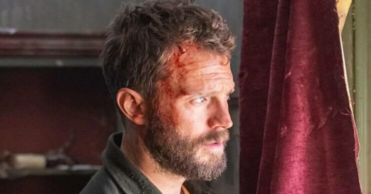 Jamie Dornan as Elliot Stanley peers in The Tourist series 2