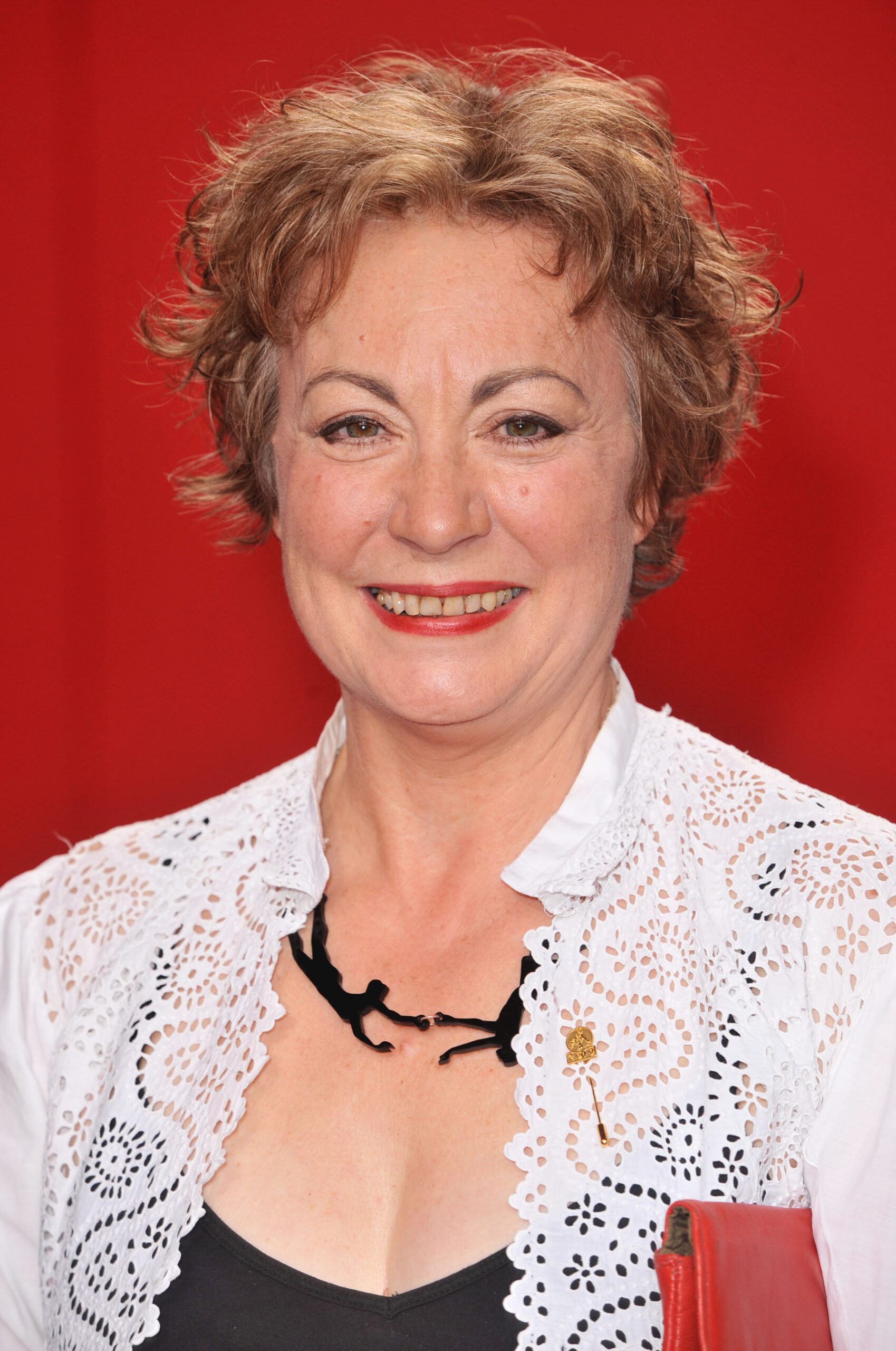 Coronation Street star Anita Carey smiling at event