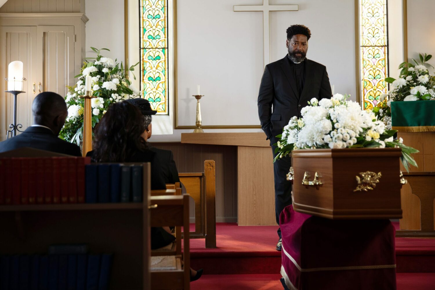Charles is upset as he looks at his dad's coffin in Emmerdale spoilers