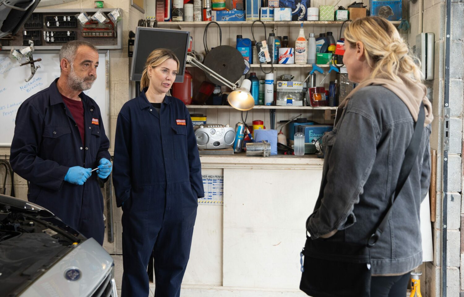 Kevin and Abi look at Cassie reassuringly in Corrie