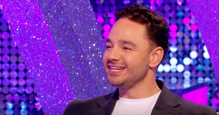 Adam Thomas looking happy on Strictly: It Takes Two (Credit: BBC)