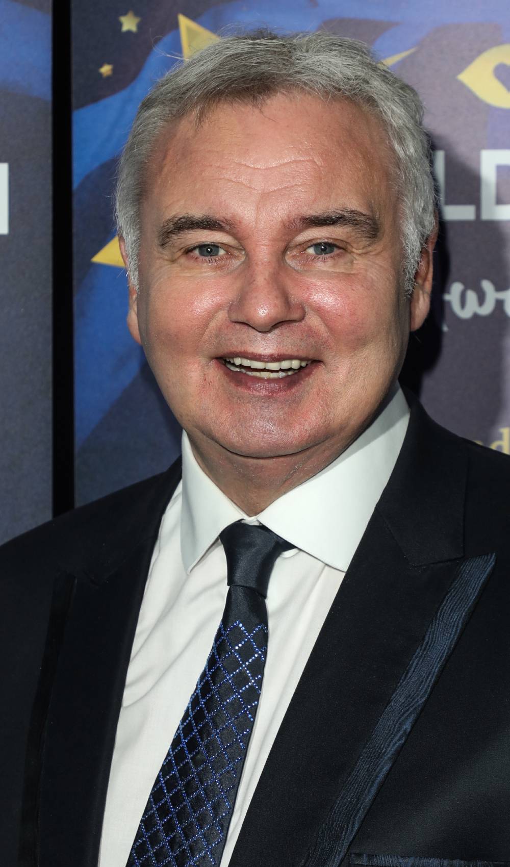 Eamonn Holmes smiles