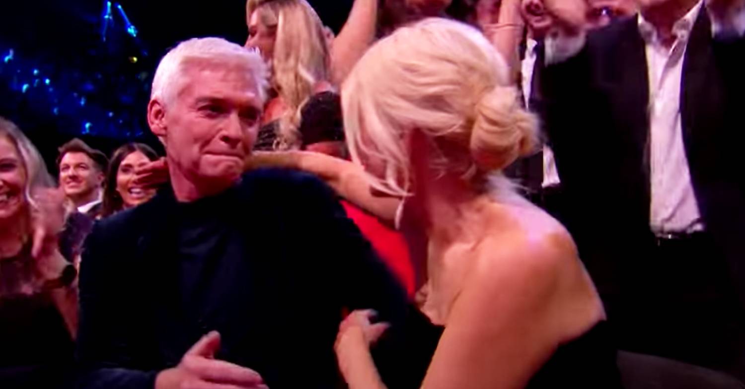Phillip Schofield and Holly Willoughby hug at the NTAs 2022
