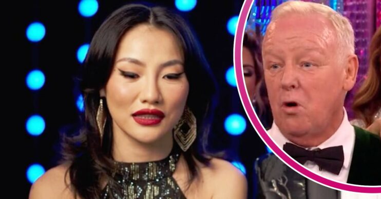 Nancy Xu looks down, her Strictly partner Les Dennis looks surprised