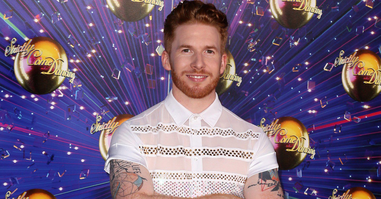 Neil Jones smiling while appearing at a Strictly Come Dancing press event