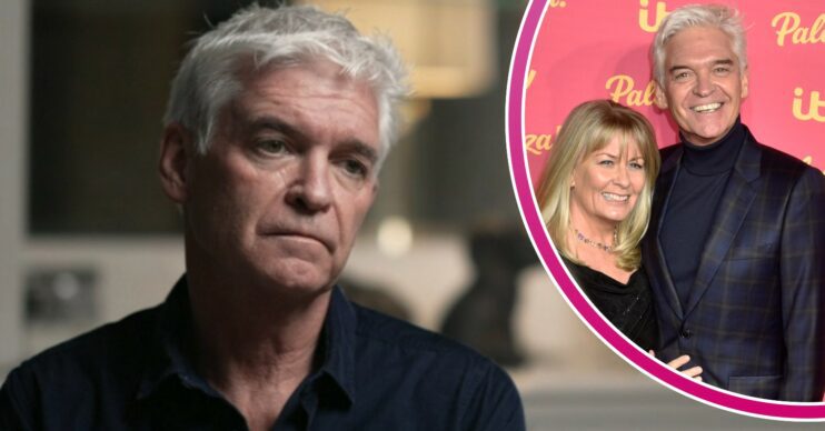 Phillip Schofield looking down in BBC interview, with wife Steph at ITV Palooza
