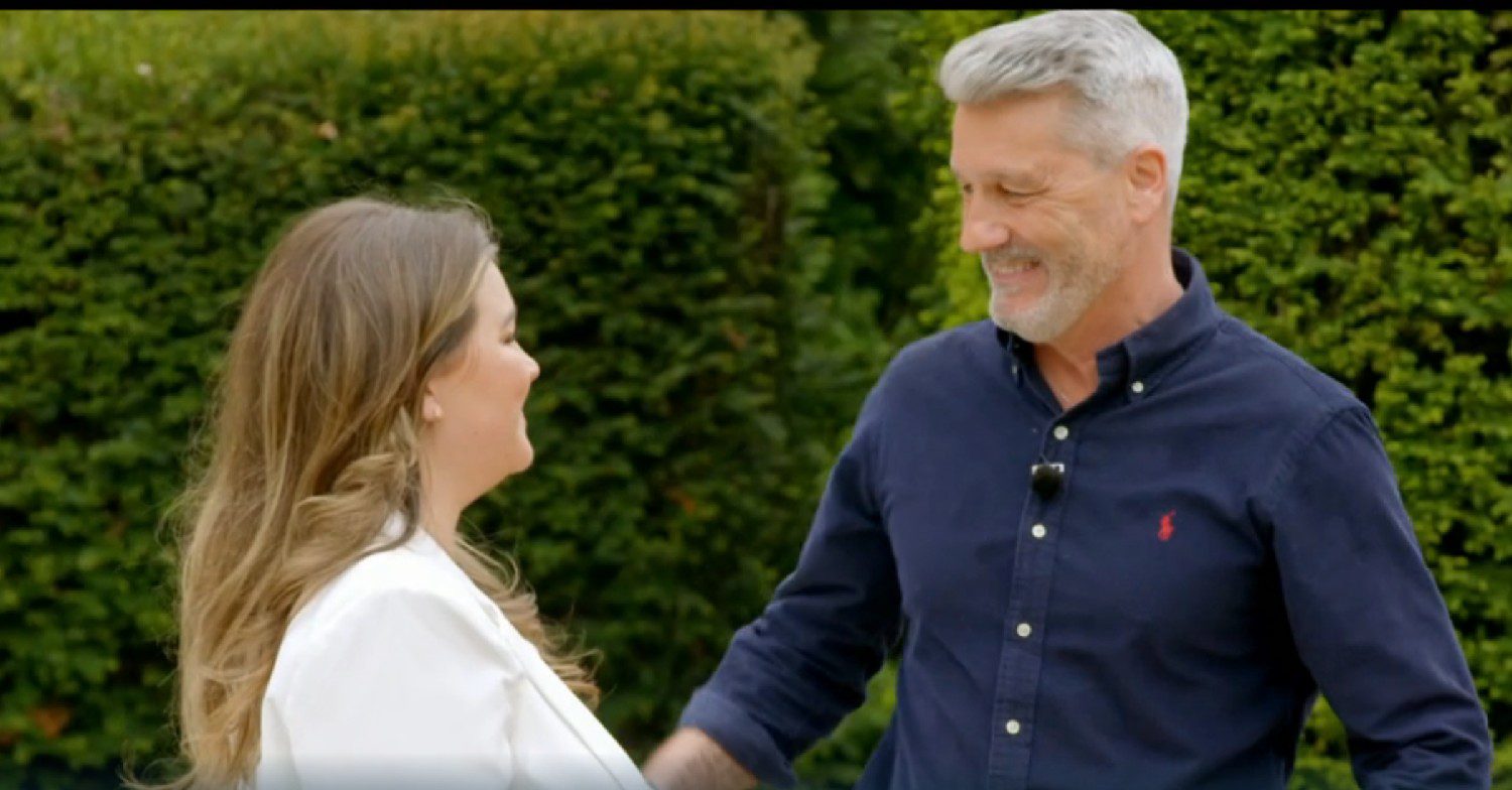 Roger smiling and about to hug his daughter Jess on the ITV show Your Mum, My Dad