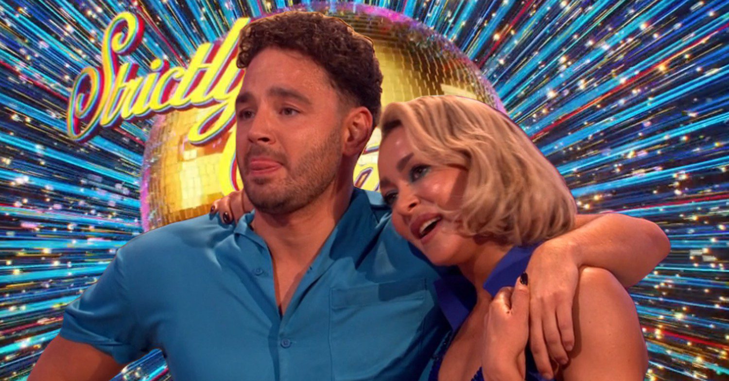 Adam Thomas hugging Luba Mushtuk in front of Strictly logo