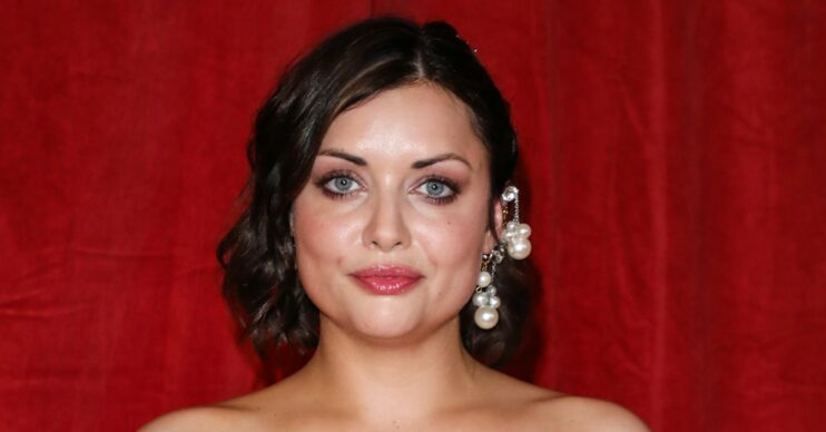 EastEnders star Shona McGarty posing at event