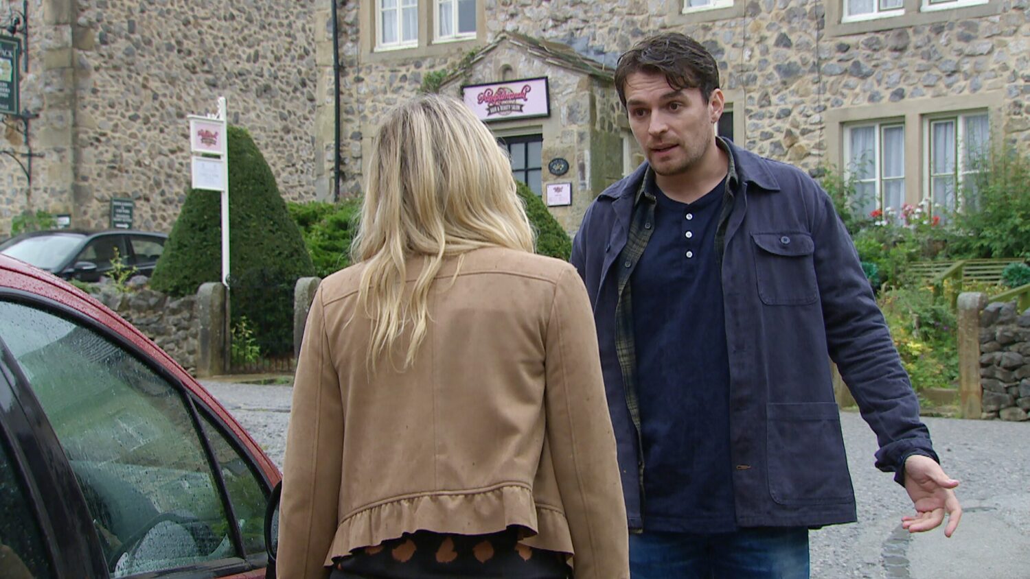 Emmerdale's Mack is speaking to Charity outside