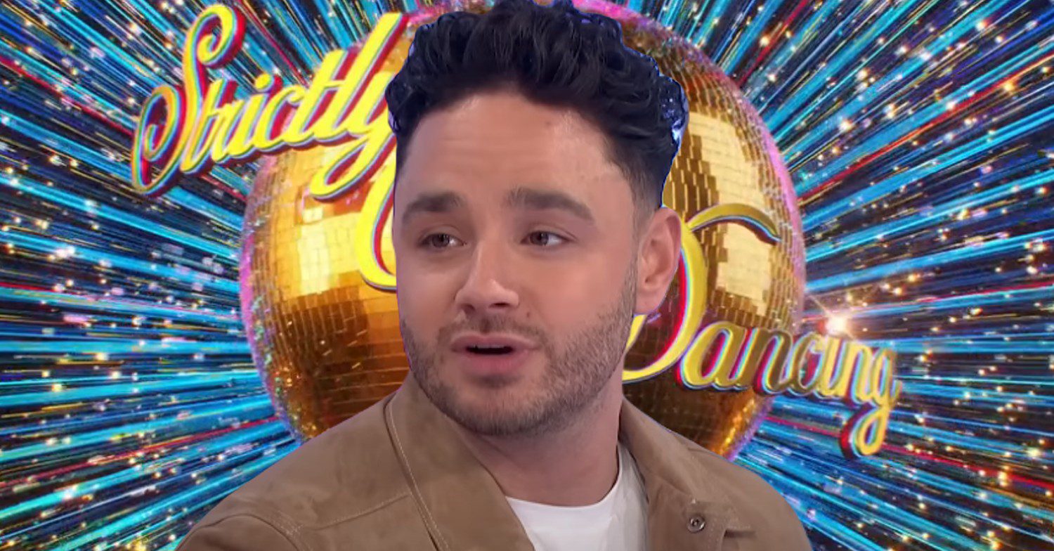 Adam Thomas in front of Strictly logo