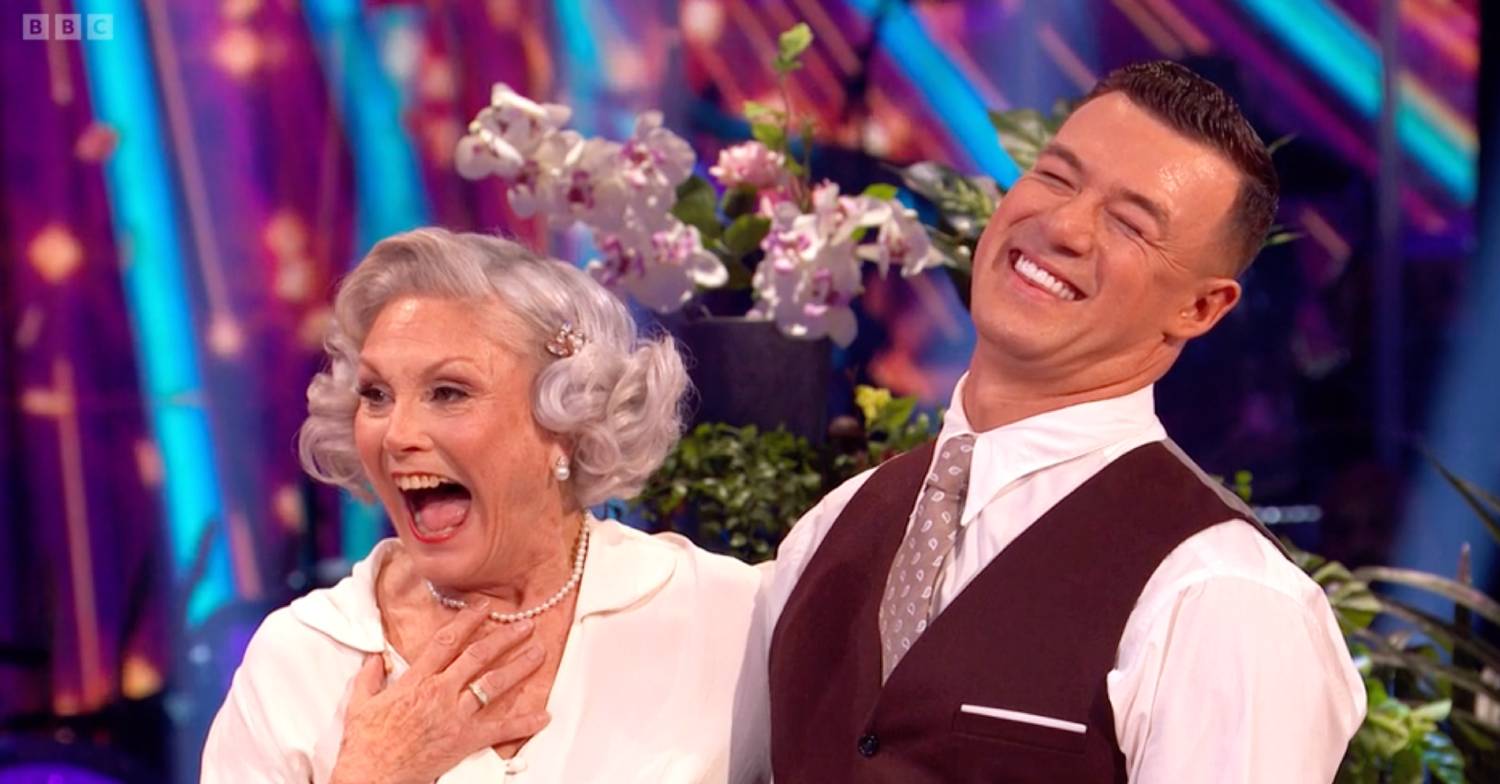 Angela Rippon and Kai Widdrington laugh