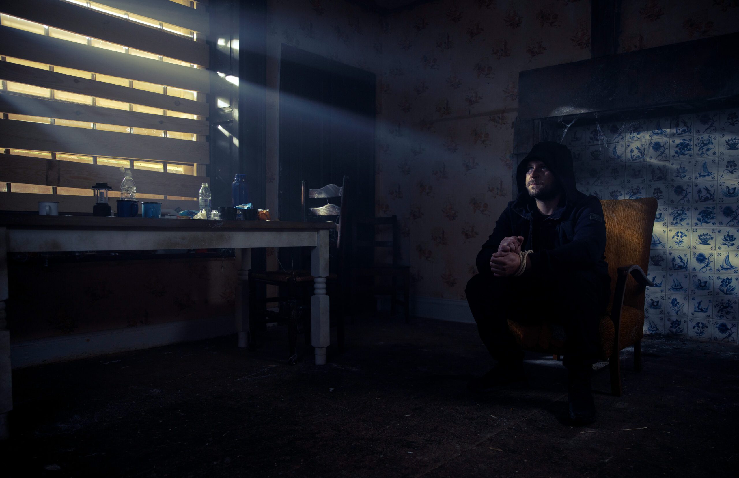 Emmerdale's Aaron is tied up in a dark barn